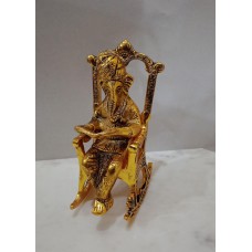 Golden Metal Lord Ganesh Idol In Rocking Chair